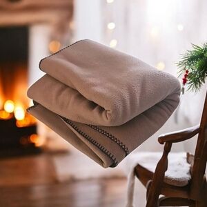 Attitude blanket Chocolate brown throw 59x87 photo on queen bed. Soft fe…